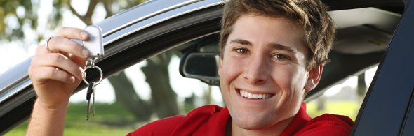 Happy student celebrating passing their driving test