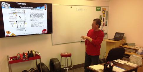 Driving school classroom traction lesson